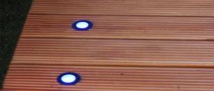 LED step light installed in patio decking